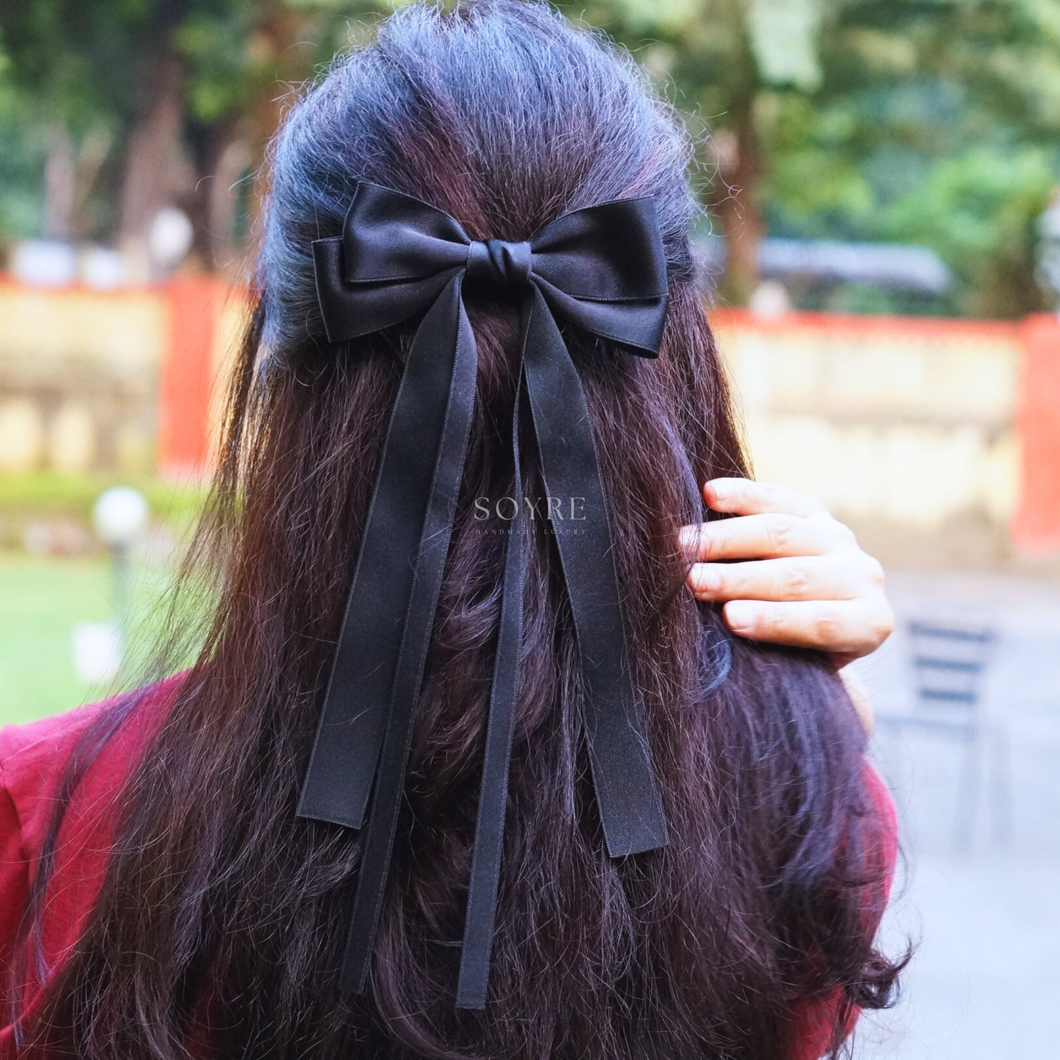 Black Long Tail Bow Hair Clip Ð Sleek Minimal Statement - Lifestyle Image