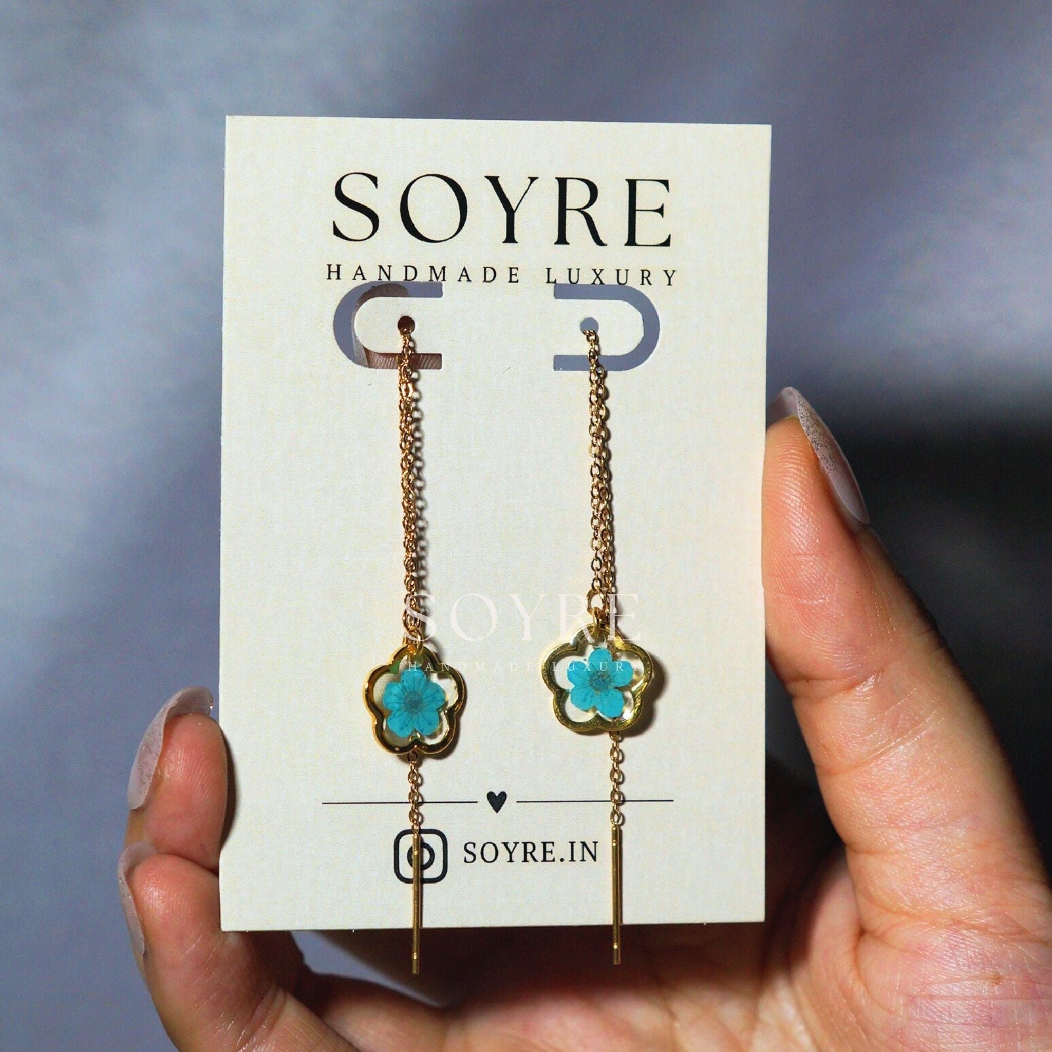 Handmade earrings made of real flowers