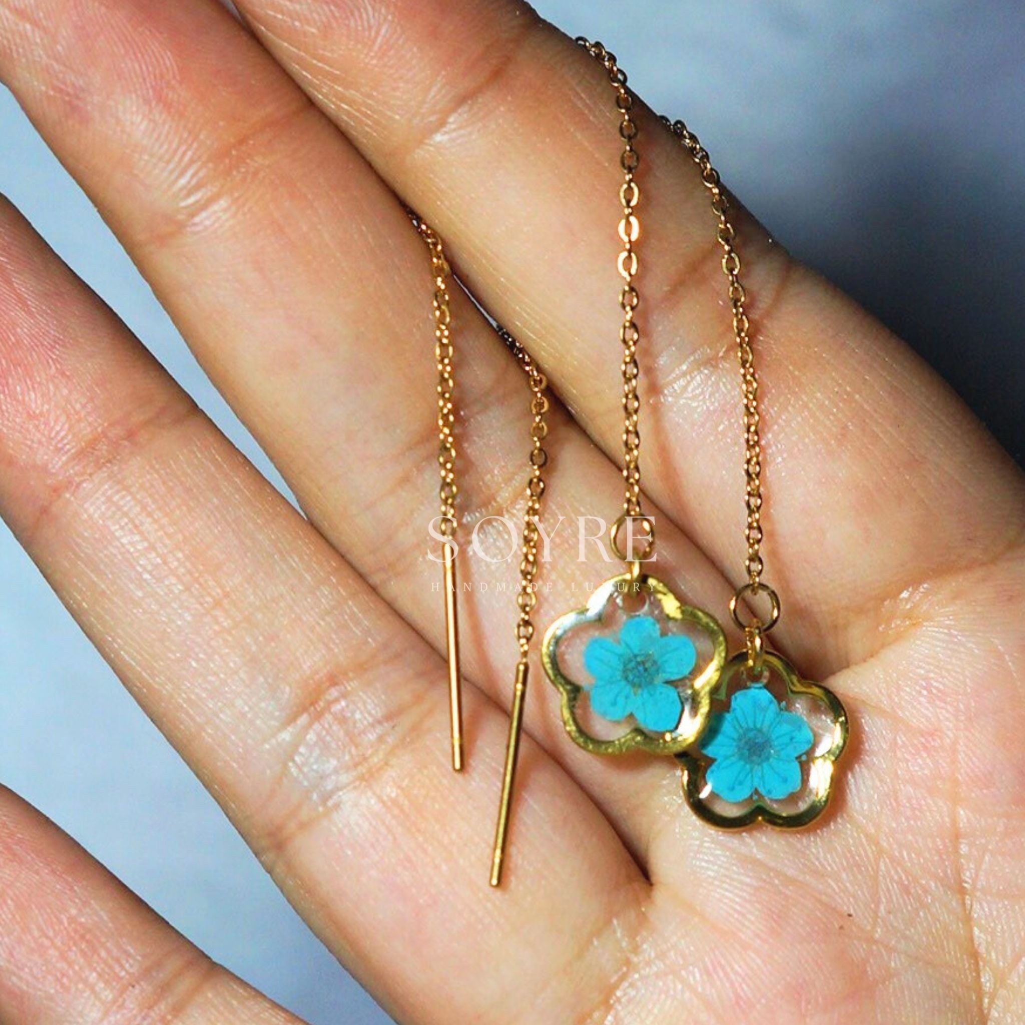 Handmade jewelry earrings made of real flowers