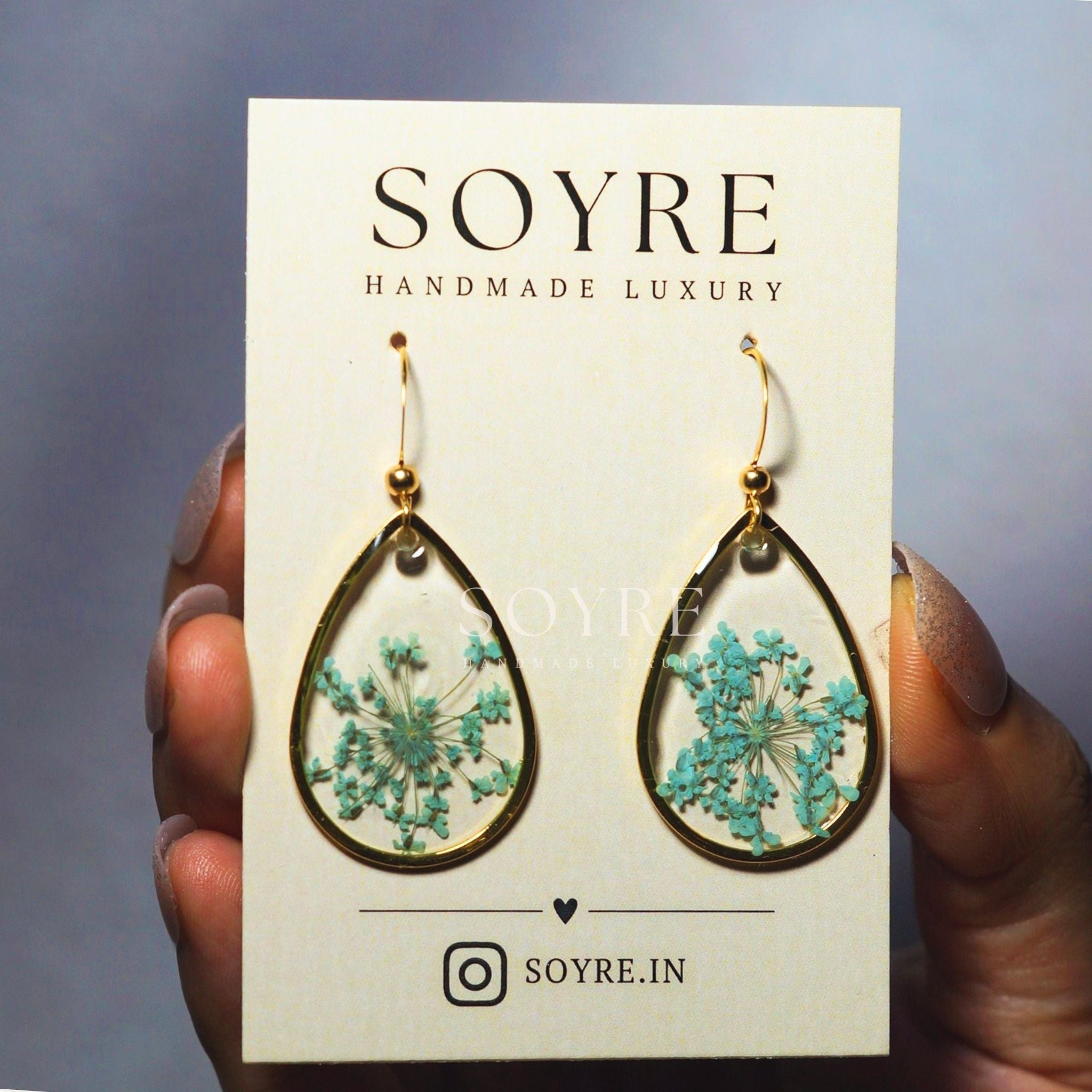 Handmade earrings made of real flowers