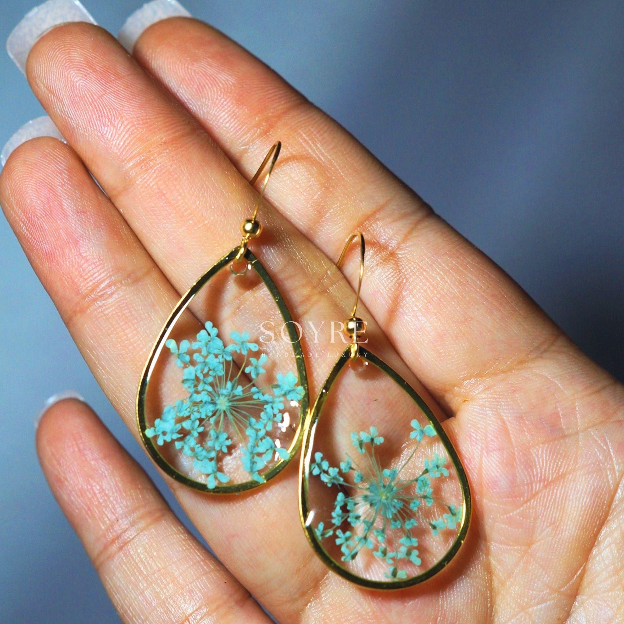 Handmade jewelry earrings made of real flowers