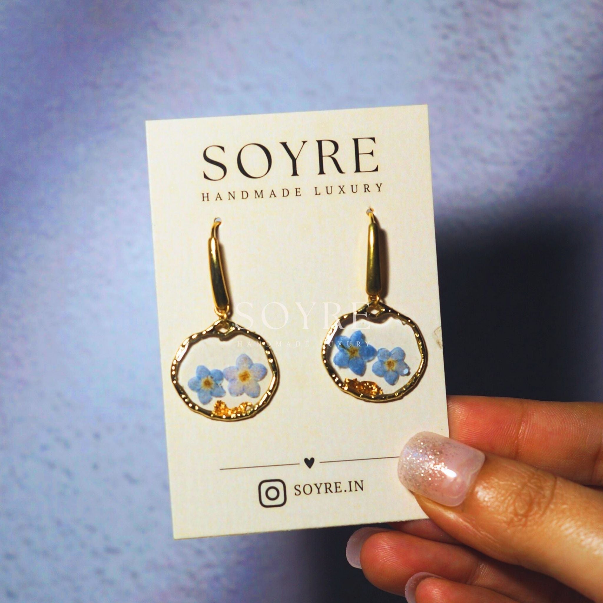 Handmade earrings made of real flowers