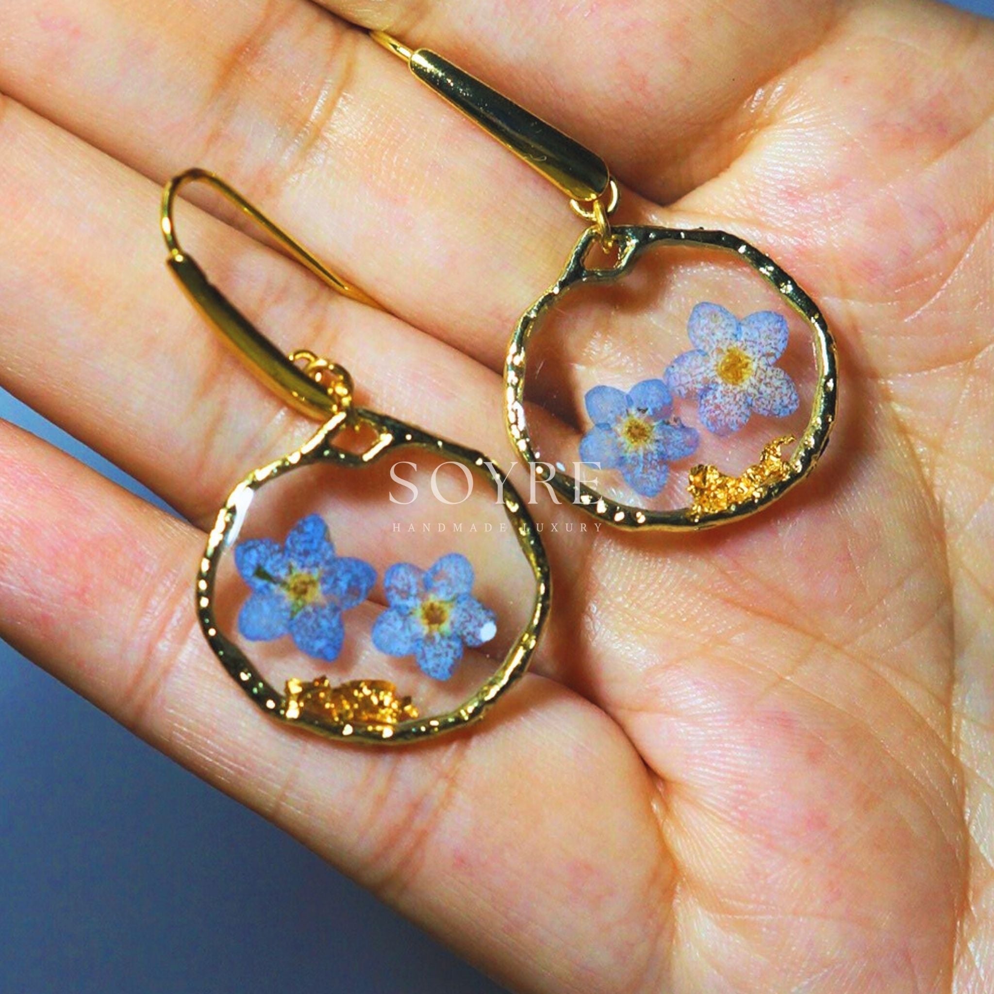Handmade jewelry earrings made of real flowers