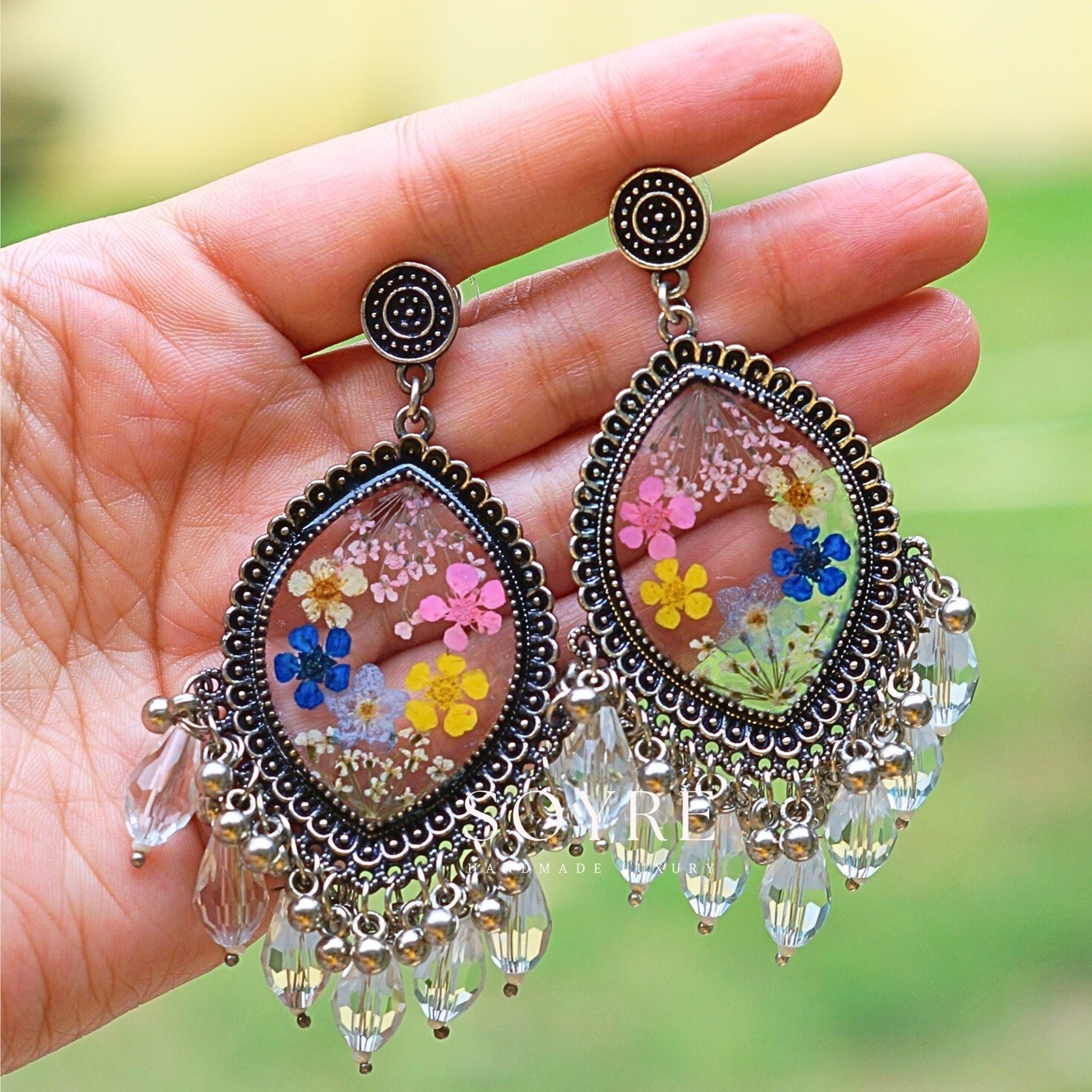 Handmade earrings made of real flowers