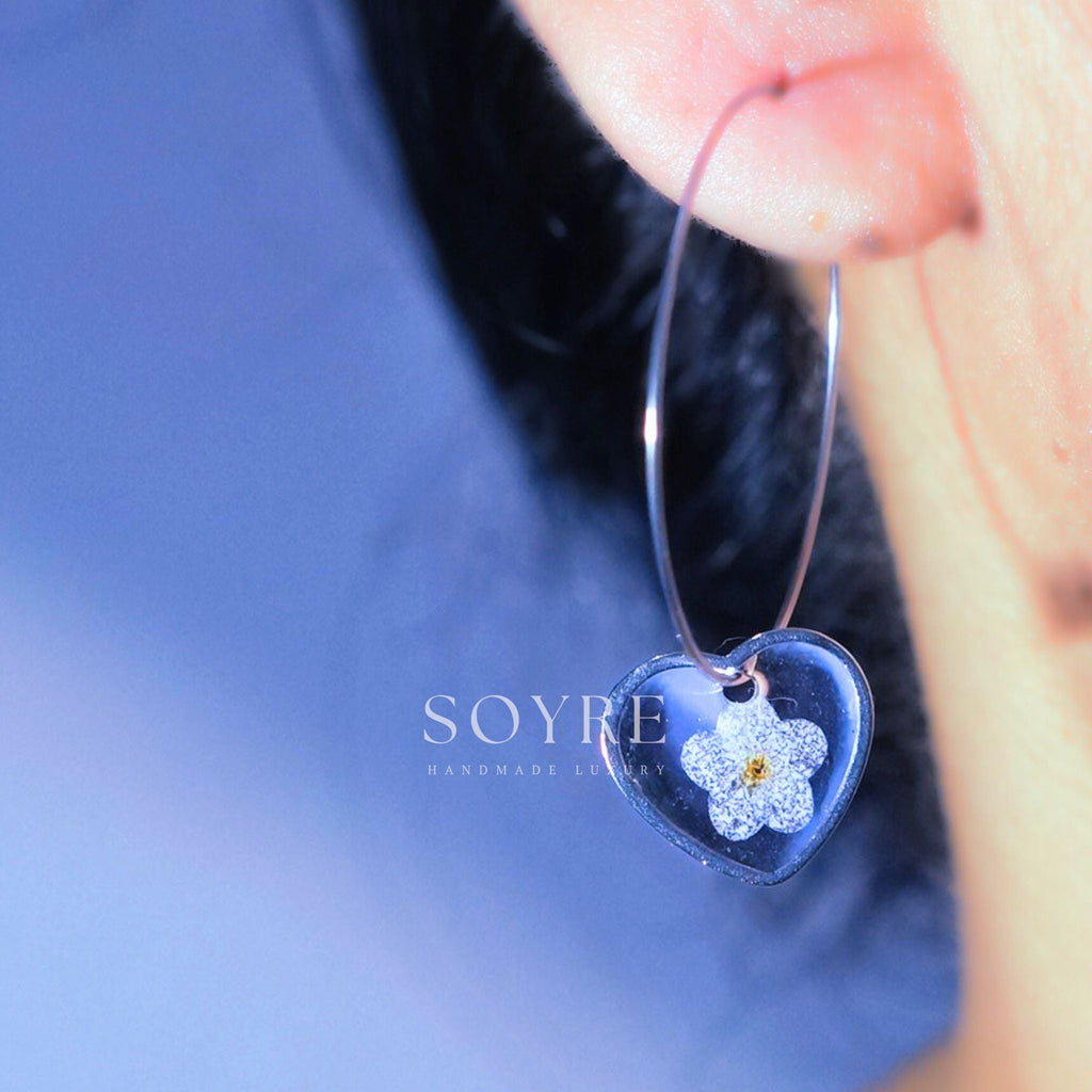 Handmade jewelry earrings made of real flowers