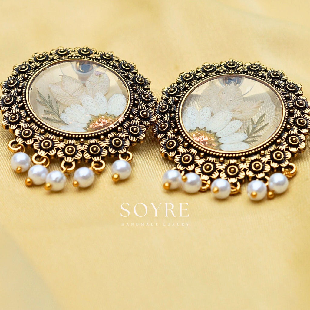 Handmade jewelry earrings made of real flowers