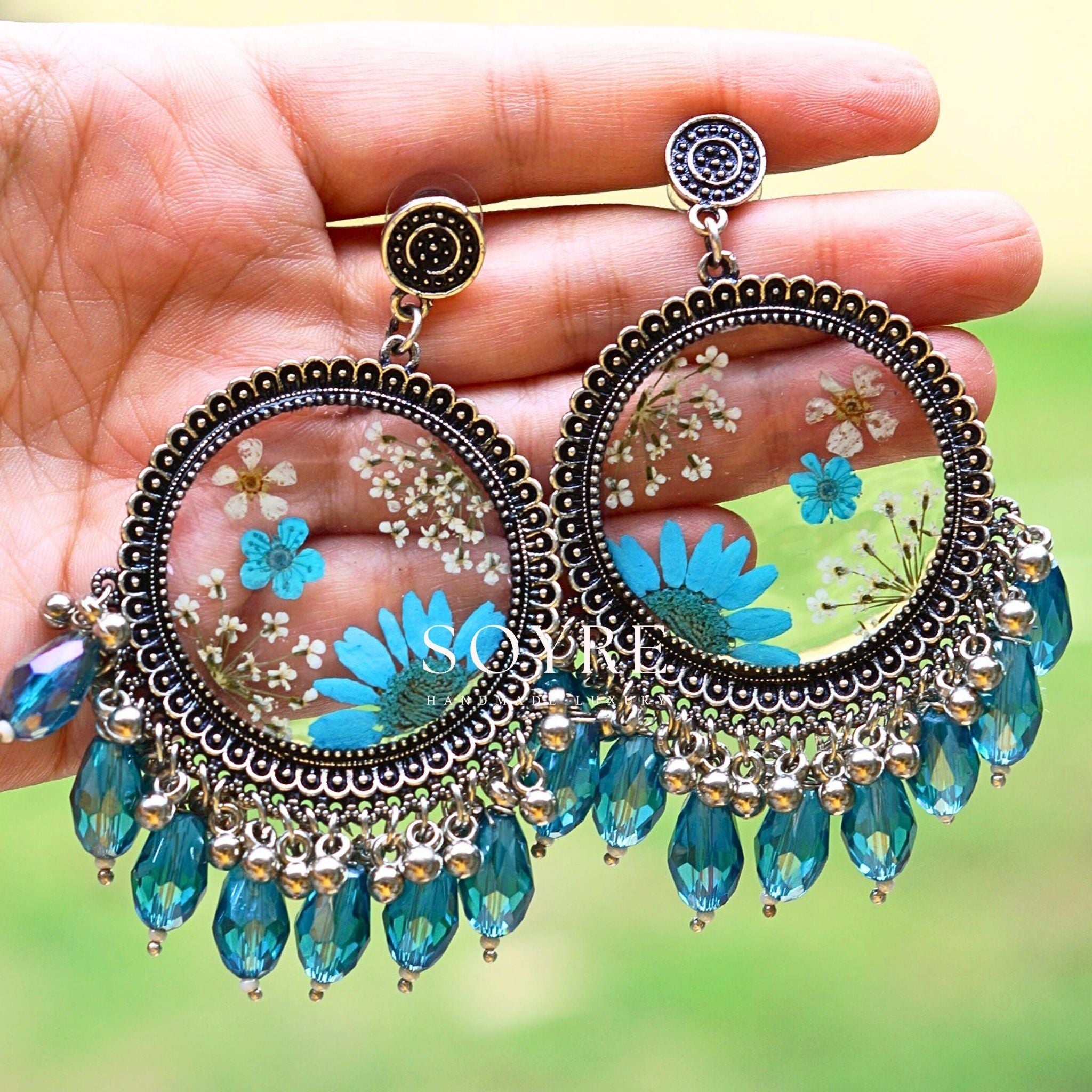 Handmade earrings made of real flowers