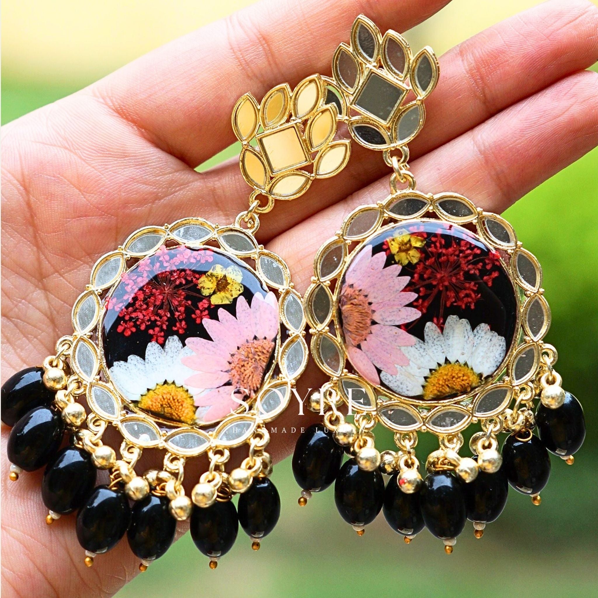 Handmade earrings made of real flowers