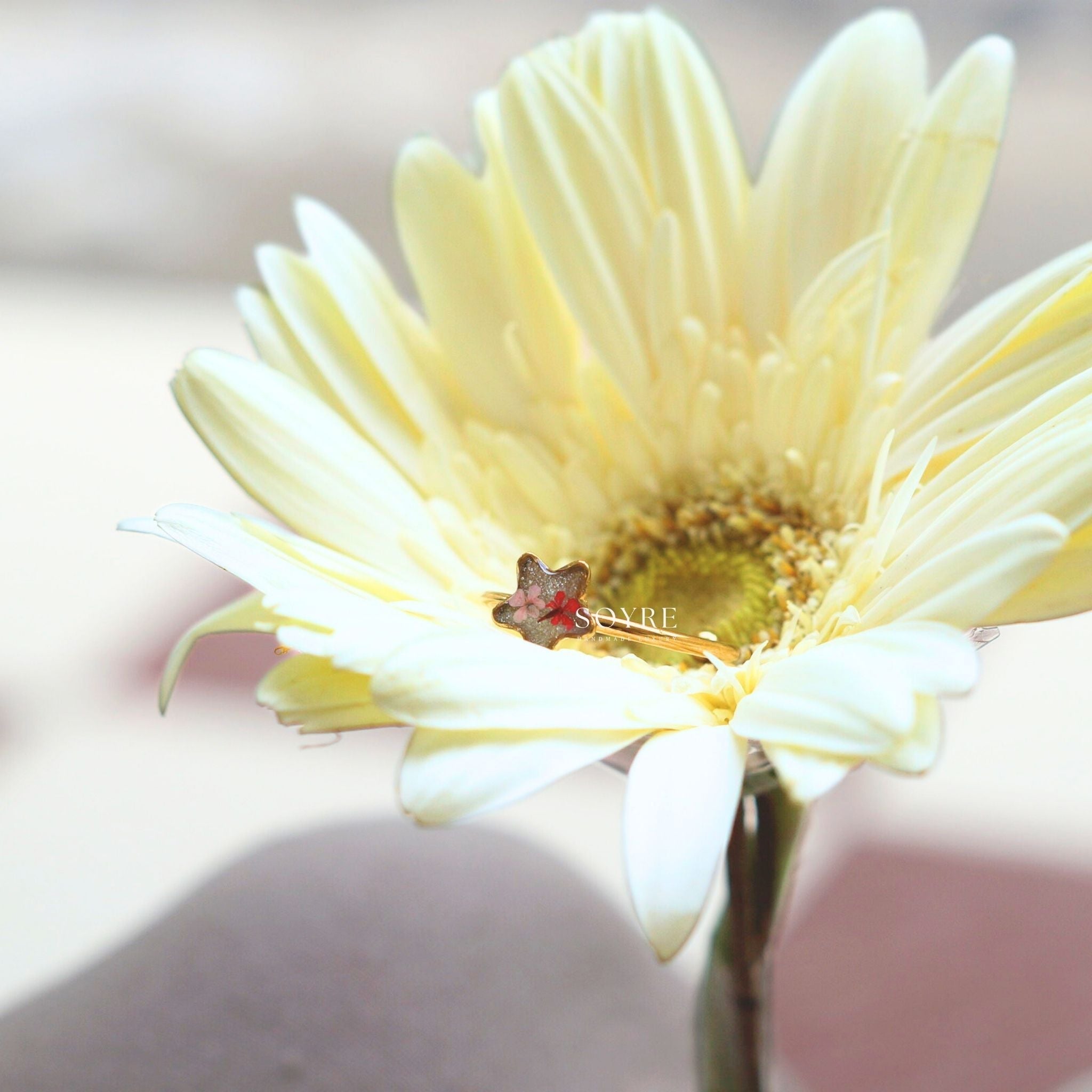 Handmade jewelry ring made of real flowers