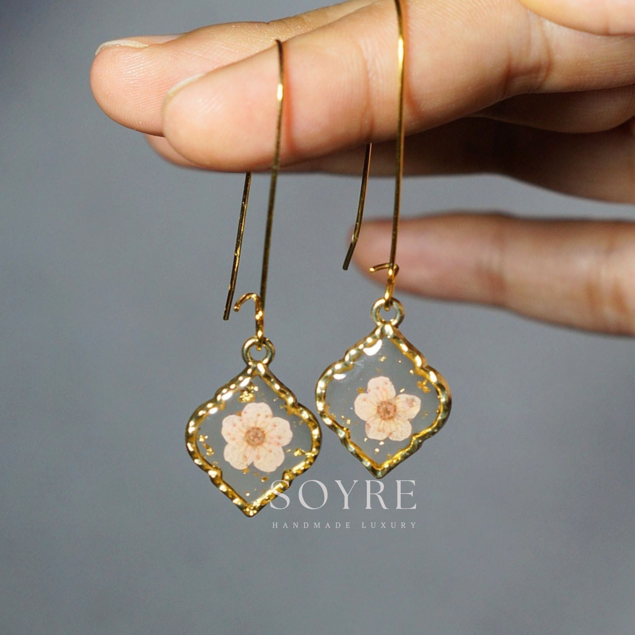 Handmade earrings made of real flowers